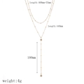Schéma technique montrant les dimensions du collier Y doré 18k et du pompon - Style en Forme de Y Double Couche avec Zircone(TN3522)