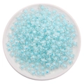 Light blue lily of the valley acrylic star beads for DIY jewelry making in a white bowl - Transparent Blue Star