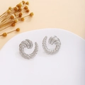 Elegante silberne gedrehte Spiral-Ohrstecker mit strukturierter Oberfläche für Damen - Silberne Spiraltextur