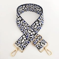 Vue détaillée de la bandoulière jacquard léopard bleu avec mousquetons dorés - N° 7 Noir Blanc Bleu