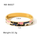 Detail view of 18k gold plated enamel bangle with 5.8cm diameter and 1cm width specifications - 18K/Width 1.0cm / White Pink Geometric (NB-B6027)
