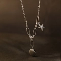 Collana con ciondolo a conchiglia e stella marina argento, stile marino, acciaio placcato 18K - Collana Stella Marina Conchiglia (81324) / Argento