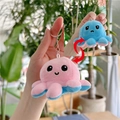 Reversible plush octopus keychain flipping from pink smiling face to blue sad face - Pink to Blue - Normal Chain