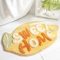 Lemon shaped yellow tufted bathroom mat with sweet HOME text on marble floor - Sweet Lemon