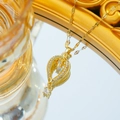 Elegante goldene Heißluftballon-Halskette mit Zirkonia-Besatz und beweglichem Stein - Heißluftballon-Halskette mit schwebendem Diamanten (C191) / Gold