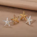 Detailed view of starfish stud earrings in gold and silver with textured finish - Gold Textured Starfish Studs (E2613G)
