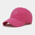 Detail of rose pink cotton baseball cap with intricate white sun embroidery and letters - Rose Red