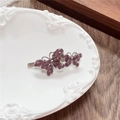 Detailed close-up of a silver-toned hair clip with purple rhinestone butterfly accents - Double Butterfly / Purple