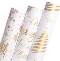 Three-pack rolls of white and gold Christmas wrapping paper with snowflake and tree patterns - Set 4