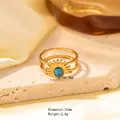 Gold plated stainless steel sunburst ring with a blue turquoise stone in a double band - Adjustable Open / JOM25025-Gold Sun Blue Stone