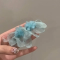Detailed view of handmade light blue tulle flower clip with layered soft petals - 22# Sky Blue Tulle Accessory (925 Sterling Silver Earring Post)