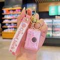 Pink camera keychain featuring a cartoon fox and a Good Luck strap with a wrist loop - Glowing Camera-Pink Fox