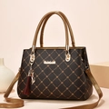 Deep brown quilted faux leather tote bag with gold handles and tassel for middle-aged women - Dark Maple & Bronze