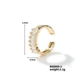 Detailed view of a gold cubic zirconia ear cuff with 2.0cm diameter and 2.1g weight - 2.5*5mm-7 Stones / Gold With White Rhinestones