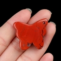 Handcrafted red jasper butterfly stone pendant with natural texture and hanging hole - Red Jasper