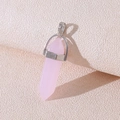 Pink quartz hexagonal prism pendant with silver clasp on textured fabric background - Pink Jade
