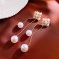 Elegant long pearl tassel earrings with gold chain and cubic zirconia accents - Gold Pearl Tassel