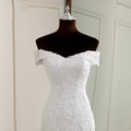 Elegant off-shoulder mermaid wedding dress in white lace with embroidery and sequins - US 2 / White