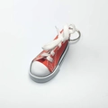 Miniature bright red canvas sneaker keychain with realistic white laces and rubber sole - Orange