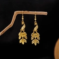 Golden peacock earrings with leaf-shaped tassel pendants and bohemian ethnic design - E5775-23 Luxury Peacock Leaf Tassel