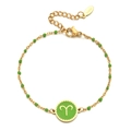 Detail of Aries zodiac stainless steel bracelet with gold and green enamel bead accents - Stainless Steel / Aries-Green