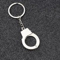 Miniature polished silver metal handcuff keychain with a sturdy keyring and chain link - Silver Single Handcuff