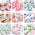Macro view of colorful acrylic beads with hearts and dots for DIY jewelry making - Mixed Colors