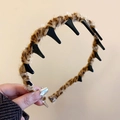 Plush leopard print headband with non-slip shark teeth design for a secure fit - Leopard Toothed Style / Brown