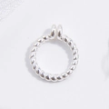 Macro shot of silver twisted metal open jump ring with rope texture for jewelry making - 8mm / Silver Twisted Rope 8mm