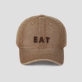 Close-up of vintage washed denim baseball cap featuring EAT letter embroidery - M (56-58cm) / Brown
