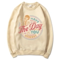 Beige sweatshirt featuring Have The Day You Deserve text and skull hand graphic art - Khaki