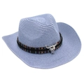 Macro detail of western straw cowboy hat featuring a vintage metal bull skull ornament - Sky Blue