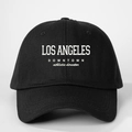 Detail of Los Angeles printed lettering and twill fabric texture on black baseball cap - One Size / Black