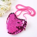 Close-up of pink sequin heart purse with plush trim and woven rope strap details - Rose Red