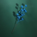 Close-up of blue glittered artificial berries on a branch for holiday floral decoration - Blue Pink 12 Heads with Wire