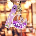 Portachiavi coniglietto lunare viola a sabbie mobili con perline e cinturino in silicone - Viola