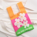 Knitted tote bag with orange, magenta and green color block design and daisy patterns - Orange-Flower
