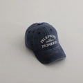 Close-up of navy blue washed cotton baseball cap with white vintage letter embroidery - 54cm (3-8 Years) / Navy Blue