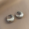 Polished silver chunky hoop earrings with a teardrop silhouette and snap closure - Oval Plain Hoop / Silver