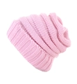 Close-up of pink knit winter beanie showing thick textured yarn and warm ribbed fabric detail - One Size / Pink