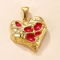 Golden heart pendant with red enamel inlay and hammered texture on stainless steel - Gold Heart Pendant with Red Enamel Dots
