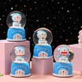 Dreamy Doraemon crystal ball night light with glitter and blue base Christmas ornament - 24100# (lights + Snowflakes)