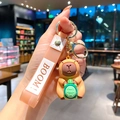 Cute brown capybara keychain with a green turtle and pink PVC hand strap accessory - B443-1 Turtle