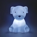 Puppy shaped night light in matte white finish glowing softly on a dark blue background - White Puppy