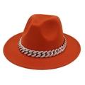 Detail of orange fedora hat featuring a silver Cuban chain with colorful rhinestones - Caramel color
