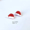 Detail view of sparkly red Christmas hat earrings with glitter finish and size specs - Christmas Hat