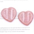 Pair of polished 40mm heart-shaped pink rose quartz worry stones with natural texture - Rhodonite