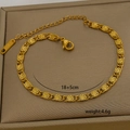 Detail of adjustable 18K gold-plated stainless steel chain with lobster clasp and tag - Textured Snake Chain (6-13)