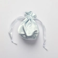 Light blue satin drawstring bag for eye masks with silk ribbon closure and soft luster - Mercerized Blue