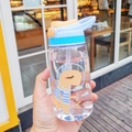 Light blue plastic kids water bottle with astronaut dinosaur print and orange handle - 16oz / Dino Blue